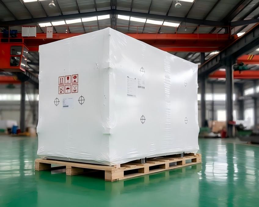 Wrapped finished product on wooden pallet inside factory warehouse for storage